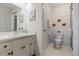 Clean bathroom with shower and updated vanity at 466 Muirfield Ct, Winter Haven, FL 33884