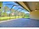 Large screened patio with brick pavers and backyard access at 192 Juliana Ridge Way, Auburndale, FL 33823