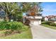 Two-story home with attached garage at 6001 Country Club Dr, Lake Wales, FL 33898