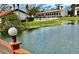 Community features a lakefront pool and Spanish-style building at 6001 Country Club Dr, Lake Wales, FL 33898