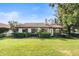 House exterior showcasing a well-maintained lawn at 6001 Country Club Dr, Lake Wales, FL 33898