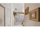 Bathroom with shower/tub combo, double vanity, and updated fixtures at 6001 Country Club Dr, Lake Wales, FL 33898