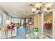 Sunroom features a dining area and comfortable seating at 6001 Country Club Dr, Lake Wales, FL 33898