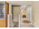 Bright entryway with stairs leading to upper level at 6001 Country Club Dr, Lake Wales, FL 33898