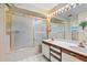Bathroom features a shower, double vanity, and updated fixtures at 6001 Country Club Dr, Lake Wales, FL 33898