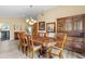 Dining room with wood table and hutch at 6001 Country Club Dr, Lake Wales, FL 33898