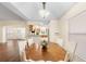Spacious dining area with a large table and hardwood floors at 627 Watercrest Dr, Haines City, FL 33844