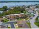 Community overview showing clubhouse and lake at 627 Watercrest Dr, Haines City, FL 33844