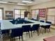 Community room with tables and chairs at 627 Watercrest Dr, Haines City, FL 33844