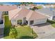 Aerial view of single-story home with landscaped yard and neighborhood at 627 Watercrest Dr, Haines City, FL 33844