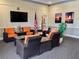 Community room features comfortable seating and a large TV at 627 Watercrest Dr, Haines City, FL 33844
