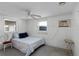 Bedroom with double bed, window, and ceiling fan at 6426 Jenny Dr, Lake Wales, FL 33898