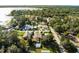 Aerial view of a lakefront community with single-Gathering homes at 6426 Jenny Dr, Lake Wales, FL 33898