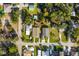 Aerial view of neighborhood with lush green trees at 6426 Jenny Dr, Lake Wales, FL 33898