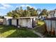 Two aged storage sheds, one metal, one block, need TLC at 6426 Jenny Dr, Lake Wales, FL 33898