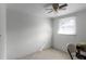 Small bedroom with window and ceiling fan at 6426 Jenny Dr, Lake Wales, FL 33898