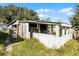 Rustic workshop with concrete block base and wooden frame at 6426 Jenny Dr, Lake Wales, FL 33898
