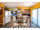 Cozy kitchen features a small dining area, perfect for casual meals at 672 Wakulla Dr, Winter Haven, FL 33884