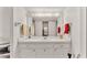 Bathroom with vanity and large mirror at 700 Mirror Nw Ter # 508, Winter Haven, FL 33881