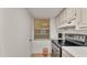 Efficient galley kitchen with built-in range and window at 700 Mirror Nw Ter # 508, Winter Haven, FL 33881