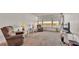 Relaxing living room with lake views and comfy seating at 700 Mirror Nw Ter # 508, Winter Haven, FL 33881