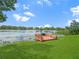 Private dock with grilling area overlooking a tranquil lake at 430 N Omaha St, Lake Hamilton, FL 33851