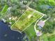 Aerial view showing home's location on a large lot with lakefront access at 430 N Omaha St, Lake Hamilton, FL 33851