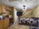Bedroom with a bed, TV, and built-in cabinets at 3511 Avenue R Nw, Winter Haven, FL 33881