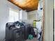 Laundry room with washer, dryer, and storage shelves at 3511 Avenue R Nw, Winter Haven, FL 33881