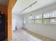 Kitchen with a dining area and outside access at 3511 Avenue R Nw, Winter Haven, FL 33881