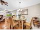 Casual dining area with a round glass table and leather chairs at 209 Santa Rosa Dr, Winter Haven, FL 33884