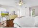 Spacious bedroom with hardwood floors and a ceiling fan at 209 Santa Rosa Dr, Winter Haven, FL 33884