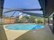 Relaxing screened-in pool area in backyard at 209 Santa Rosa Dr, Winter Haven, FL 33884