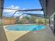 Relaxing screened-in pool with ample deck space at 209 Santa Rosa Dr, Winter Haven, FL 33884