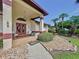 Welcoming front porch with double doors and tiled flooring at 209 Santa Rosa Dr, Winter Haven, FL 33884