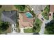 Aerial view of house with pool, showcasing the property's location and neighborhood at 209 Santa Rosa Dr, Winter Haven, FL 33884