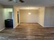 Bright dining area with wood-look floors and a chandelier at 1039 Medinah Dr, Winter Haven, FL 33884