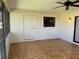 Screened porch with tiled floor, door, and window at 1039 Medinah Dr, Winter Haven, FL 33884