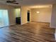 Bright dining area with wood-look floors and a chandelier at 1039 Medinah Dr, Winter Haven, FL 33884