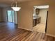 Kitchen with wood cabinets, granite counters, and black appliances at 1039 Medinah Dr, Winter Haven, FL 33884