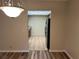 Kitchen with wood cabinets, granite counters, and black appliances at 1039 Medinah Dr, Winter Haven, FL 33884