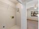 Laundry room with shelving and hookups for washer and dryer at 222 Okaloosa Dr, Winter Haven, FL 33884
