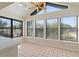 Bright breakfast nook with multiple windows and ceiling fan at 222 Okaloosa Dr, Winter Haven, FL 33884