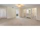 Spacious bedroom with ensuite bathroom access and large closet at 222 Okaloosa Dr, Winter Haven, FL 33884