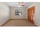 Well-lit bedroom with double-door closet and window at 222 Okaloosa Dr, Winter Haven, FL 33884