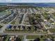 Aerial image showcasing a large neighborhood with many houses at 2304 Rose Blvd, Winter Haven, FL 33881