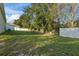 Grass backyard with a privacy fence at 2304 Rose Blvd, Winter Haven, FL 33881