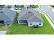 Aerial view showcasing the house's location, backyard, and surrounding neighborhood at 1274 Zambrana Ct, Winter Haven, FL 33884