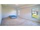 Large bedroom with two windows and carpeted floor at 1274 Zambrana Ct, Winter Haven, FL 33884