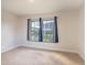 Well-lit bedroom with carpeted floor and double window at 1274 Zambrana Ct, Winter Haven, FL 33884